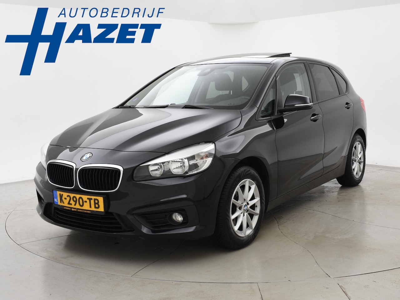 BMW 2-serie Active Tourer - 218i 136 PK AUT. + PANORAMA | STOELVERWERMING | NAVIGATIE - AutoWereld.nl