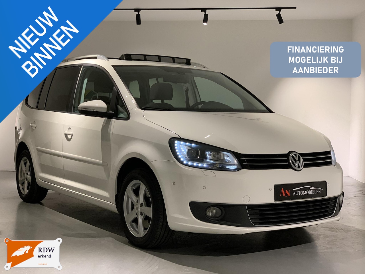 Volkswagen Touran - 1.4 TSI High line 7p. Full option Pano - AutoWereld.nl