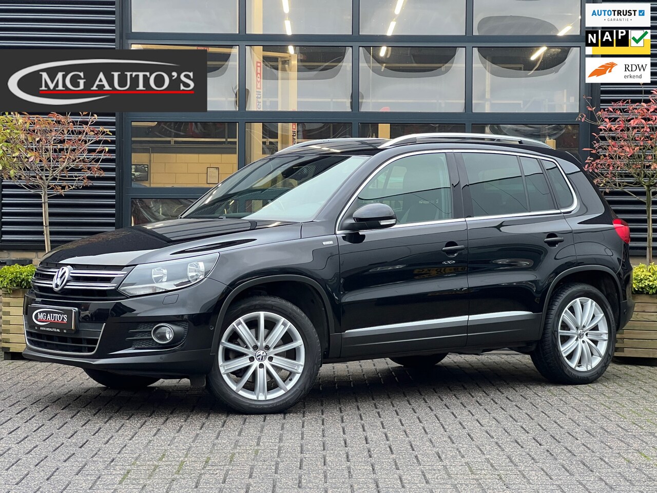 Volkswagen Tiguan - 1.4 TSI Sport&Style | Volledig Onderhouden | Pano | Trekhaak | Navi | Cruise Control | Sto - AutoWereld.nl