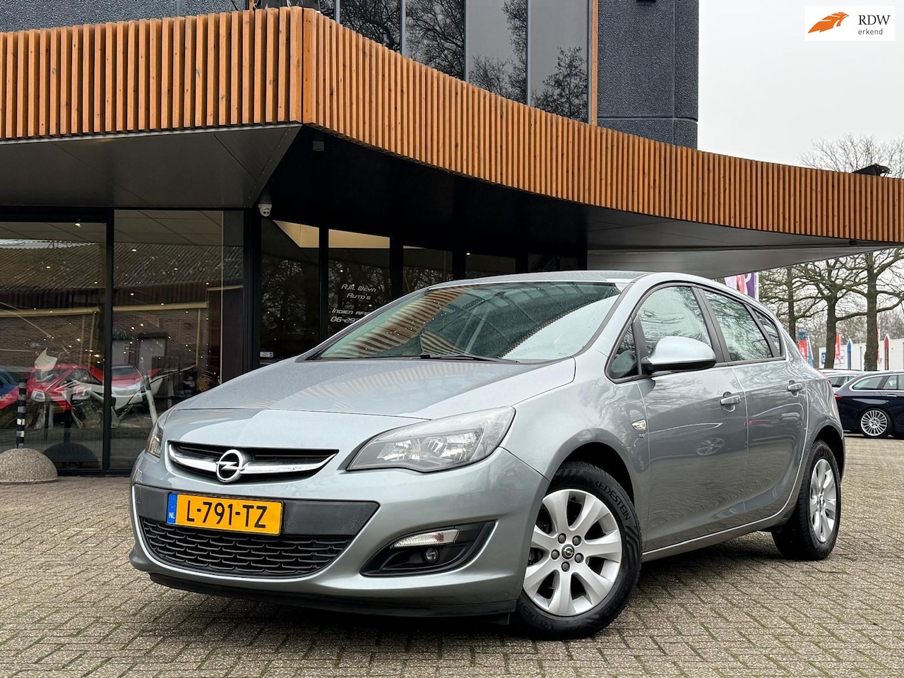 Opel Astra - 1.6 Cosmo/Stuurwielverwarming/Stoelverwarming/Bluetooth/ - AutoWereld.nl