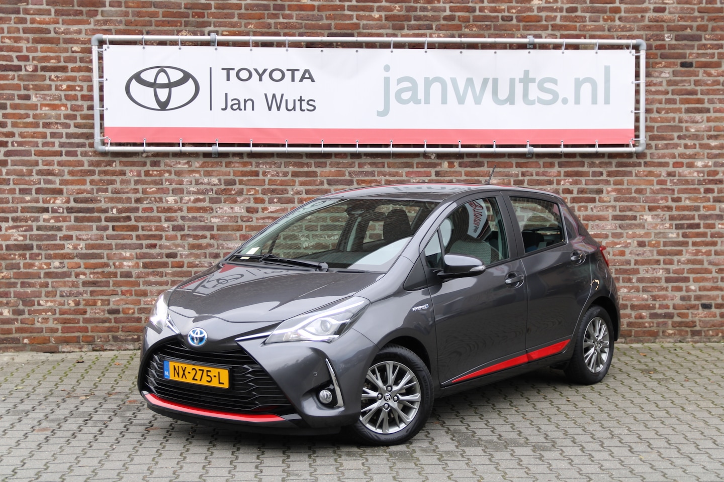 Toyota Yaris - 1.5 Hybrid Design Red 1.5 Hybrid Design Red | PDC V+A - AutoWereld.nl