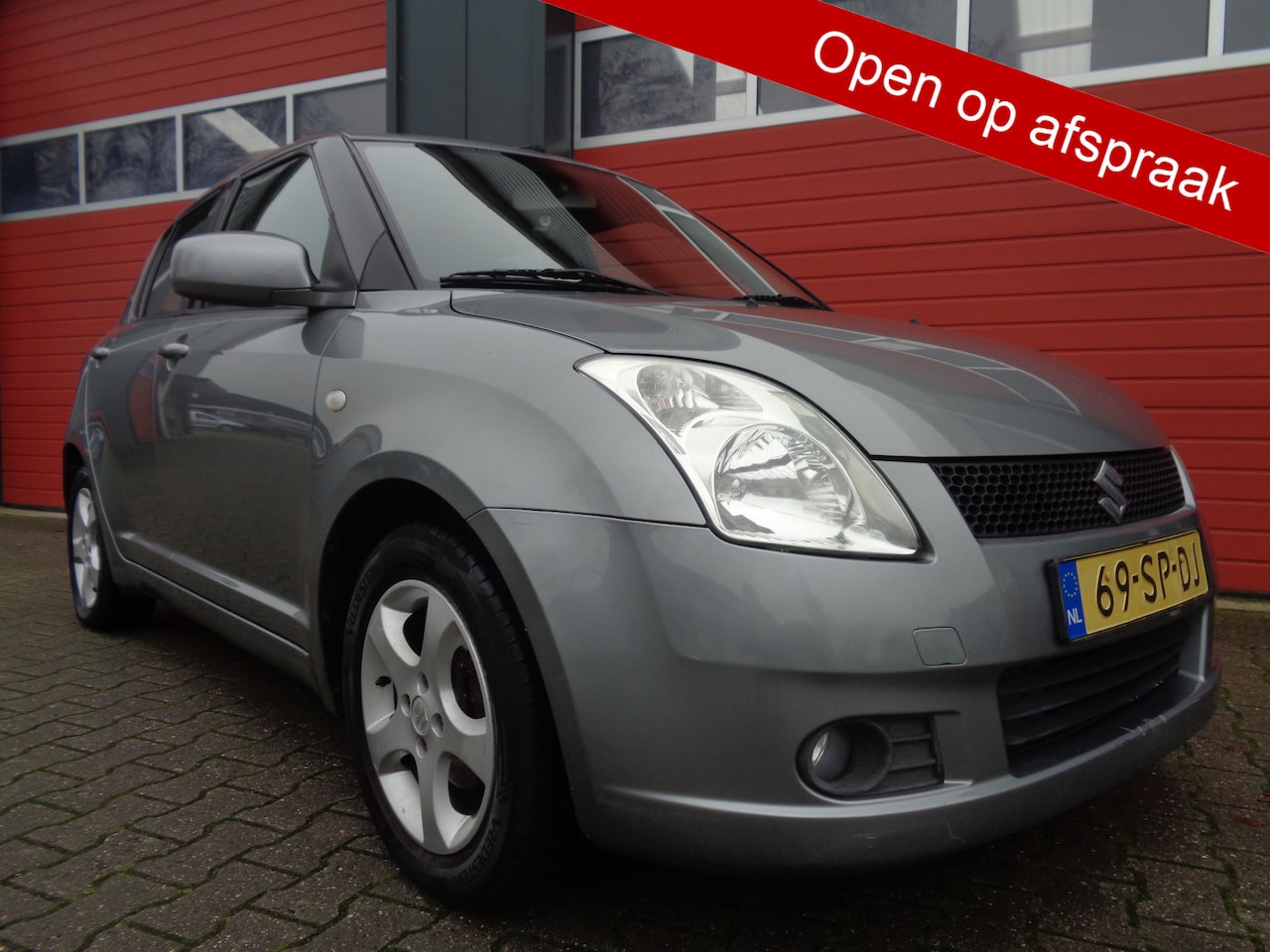 Suzuki Swift - 1.3 Exclusive 93PK Airco LMV 5DRS NL-Auto - AutoWereld.nl