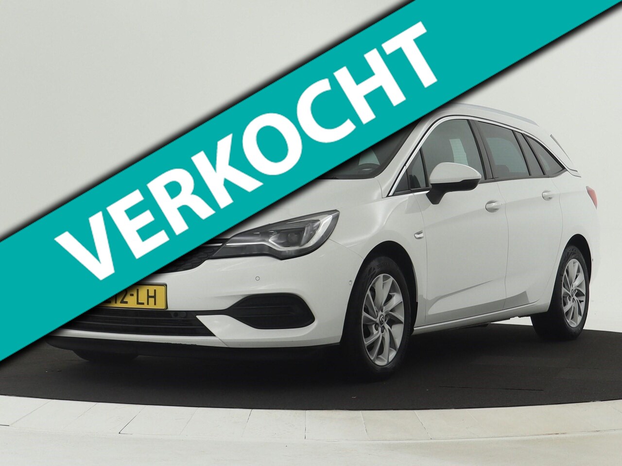 Opel Astra Sports Tourer - 1.2 Turbo Elegance PANO | Stoel-/stuurverwarming | CarPlay - AutoWereld.nl