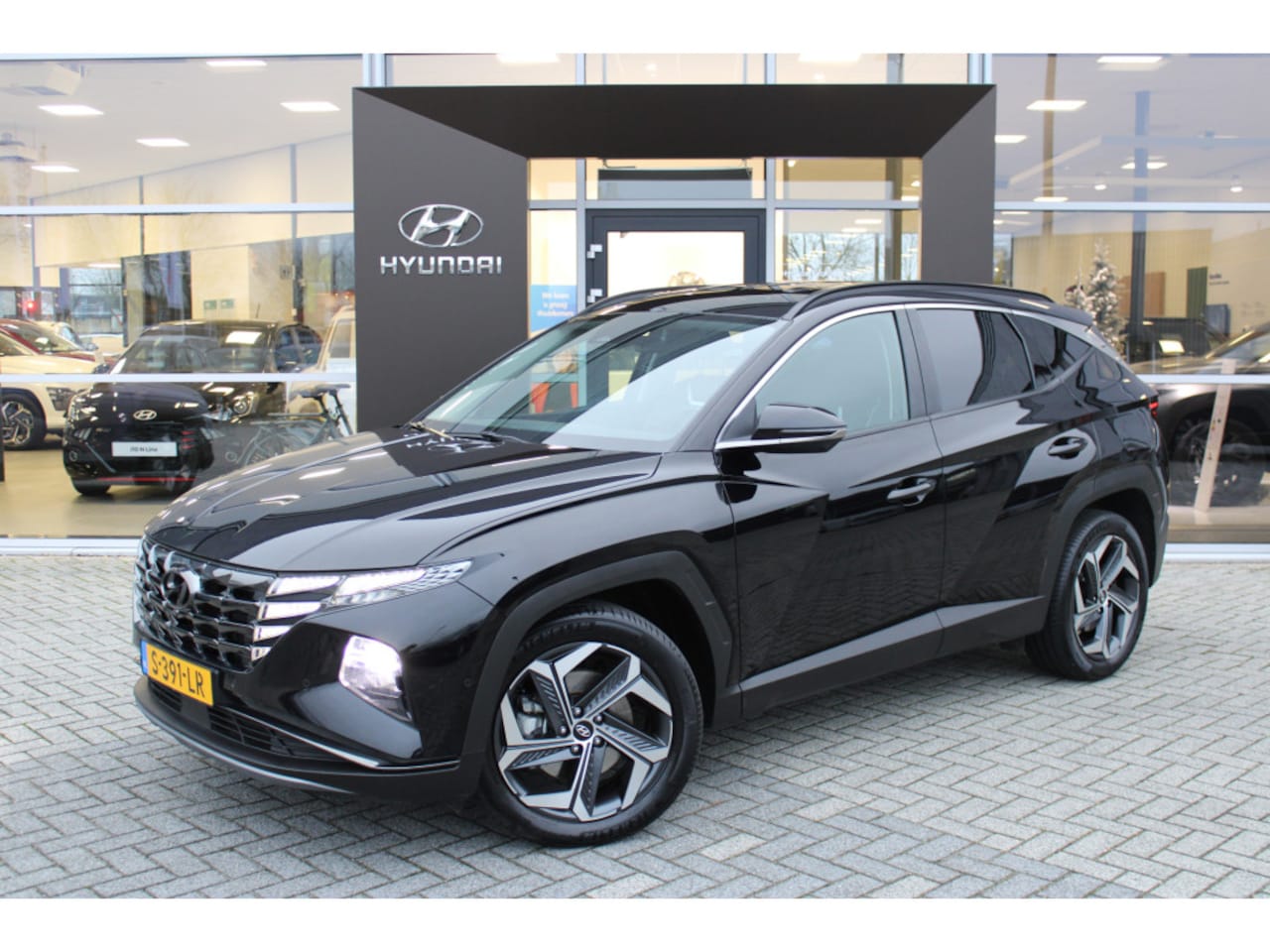 Hyundai Tucson - 1.6 T-GDI HEV Premium 1.6 T-GDI HEV Premium - AutoWereld.nl