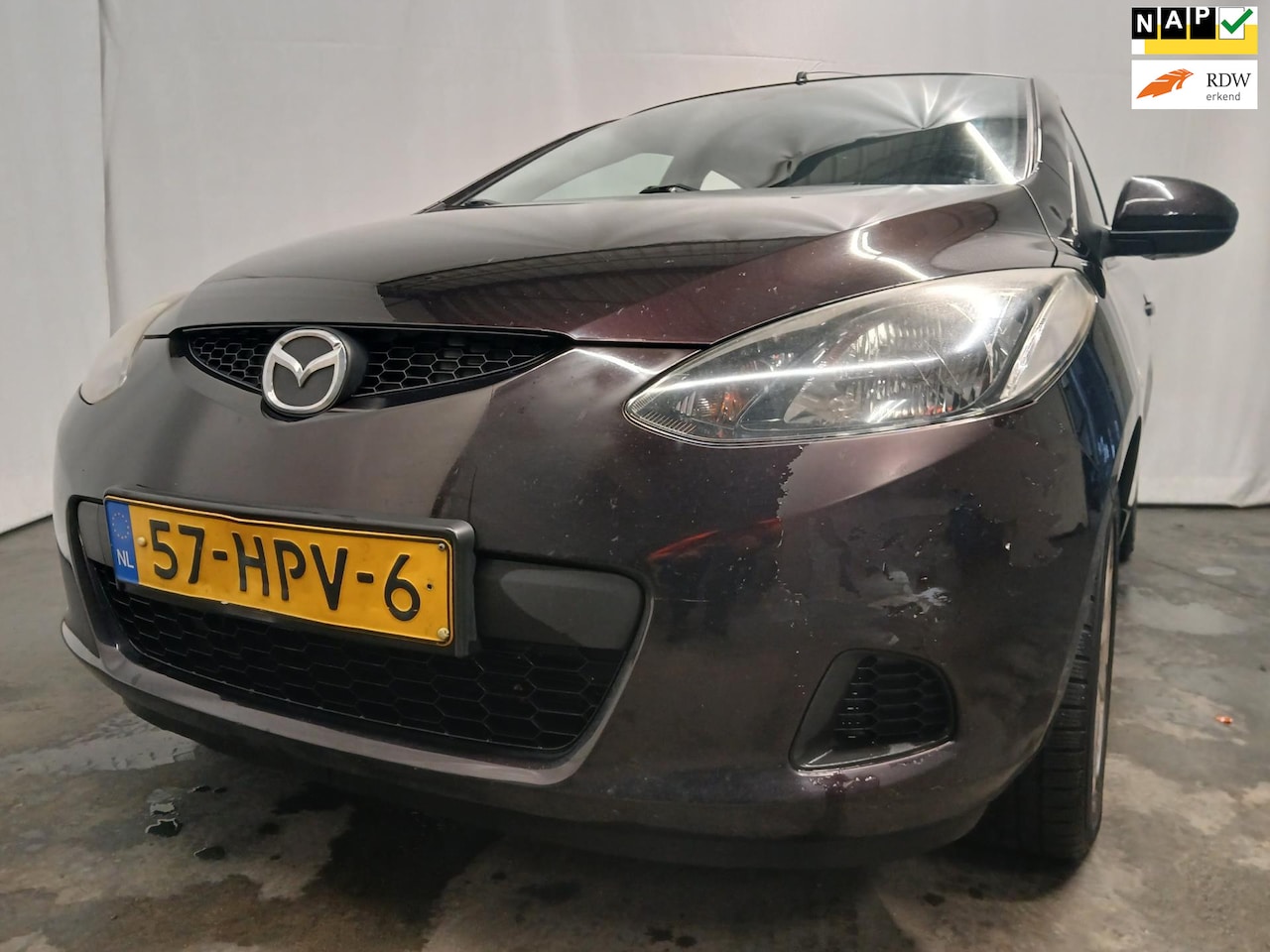 Mazda 2 - 1.3 S-VT Touring - Airco - Rechter Zijschade - AutoWereld.nl