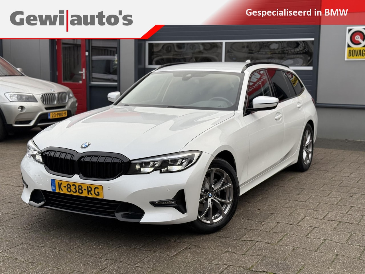 BMW 3-serie Touring - 320i High Executive Sport - AutoWereld.nl