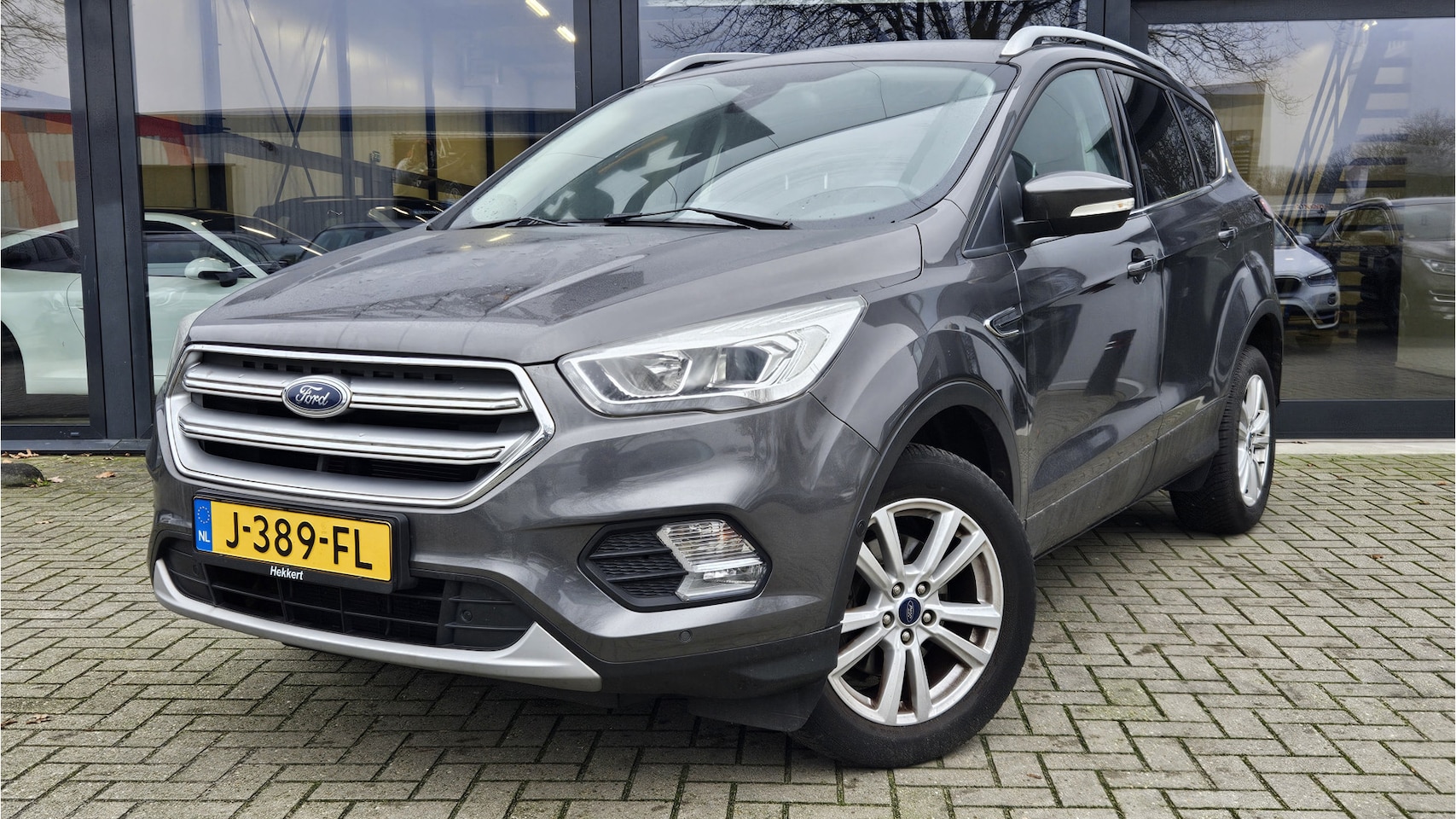 Ford Kuga - 1.5 EcoBoost Titanium Editie + KLIMA + NAVI + CRUISE + LM VELGEN - AutoWereld.nl