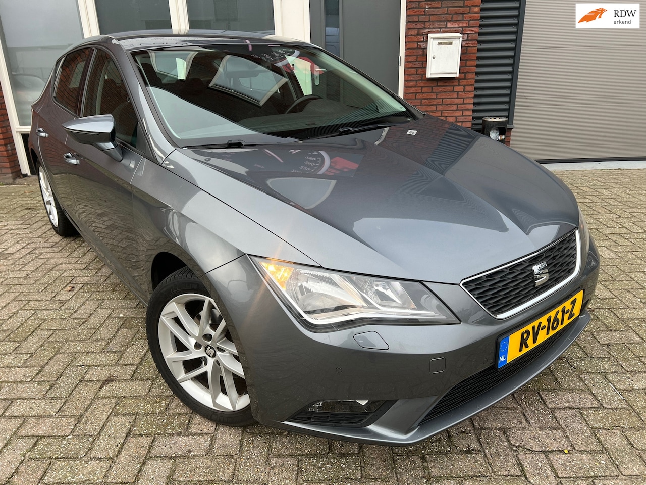 Seat Leon - 1.2 TSI Style Business / Navi / PDC / Clima / BT - AutoWereld.nl