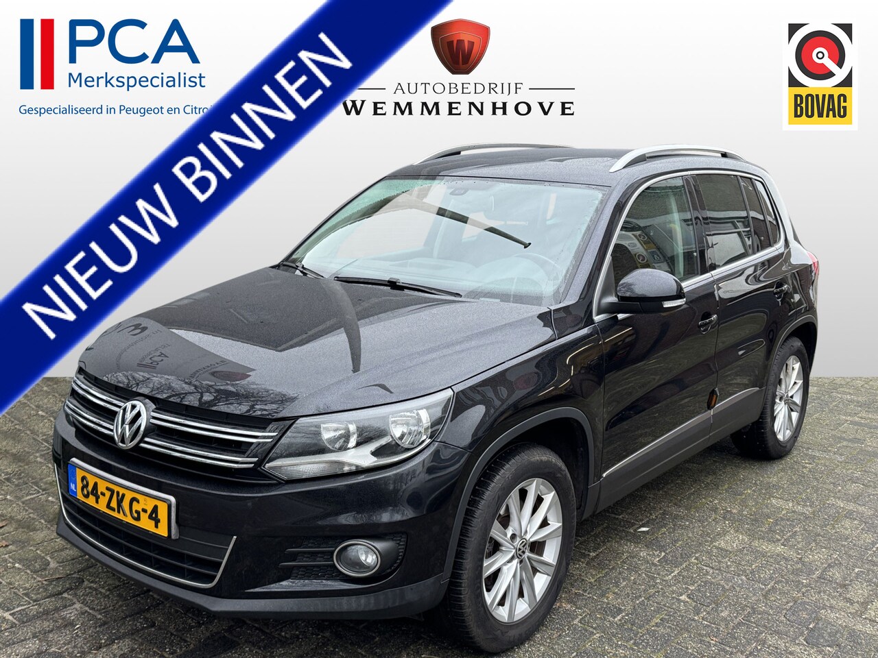 Volkswagen Tiguan - 1.4 TSI Sport&Style Airco/Lichtmetalen velgen/Pano - AutoWereld.nl