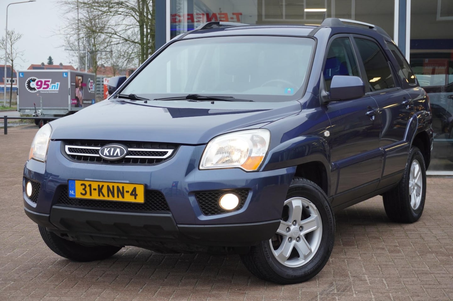 Kia Sportage - 2.0 CVVT X-ecutive | 5deurs | Airco | Elek. pakket | 1e eigenaar | Trekhaak | Clima | Inru - AutoWereld.nl