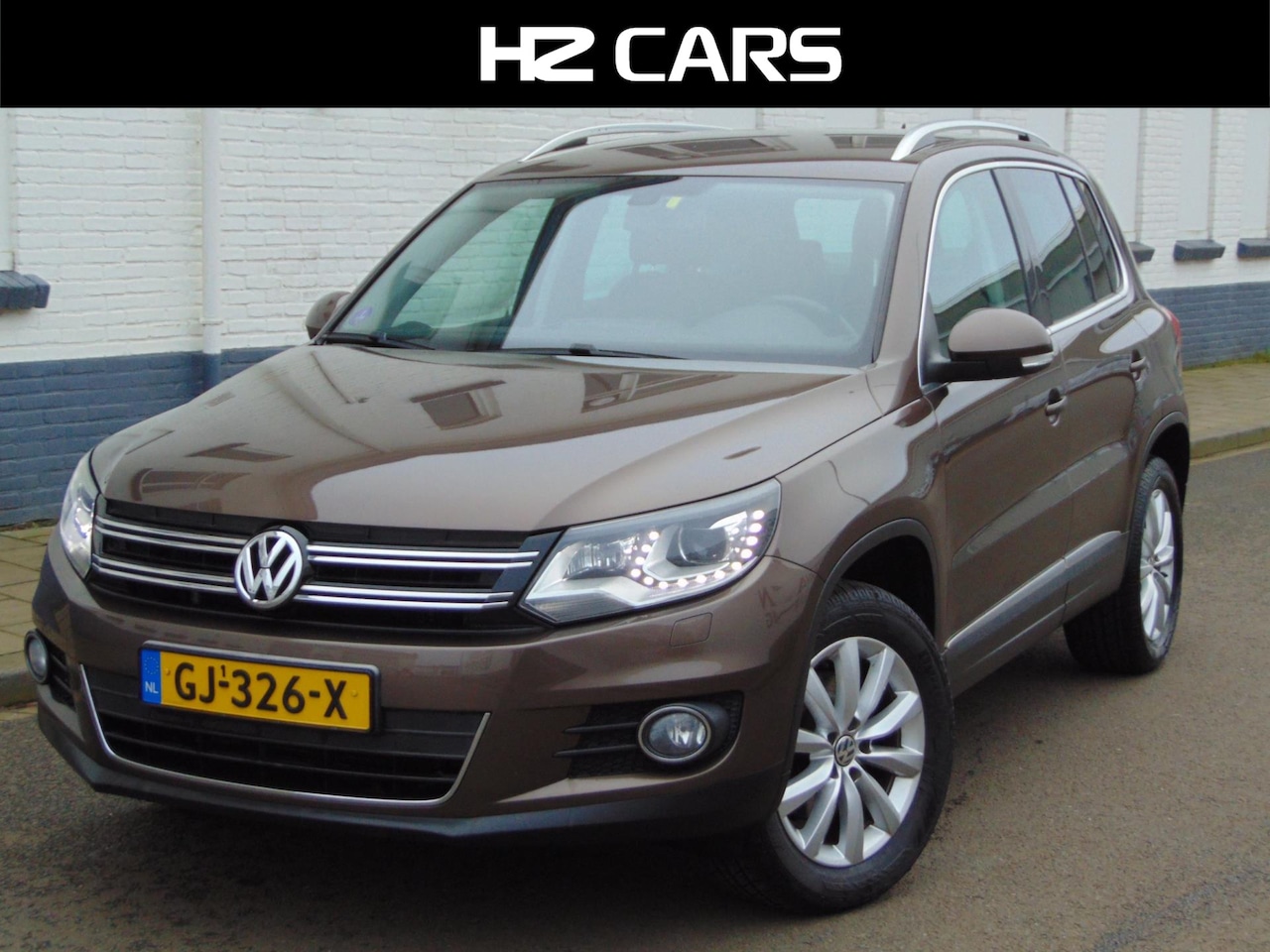 Volkswagen Tiguan - 2.0 TSI Sport&Style 4Motion automaat - AutoWereld.nl