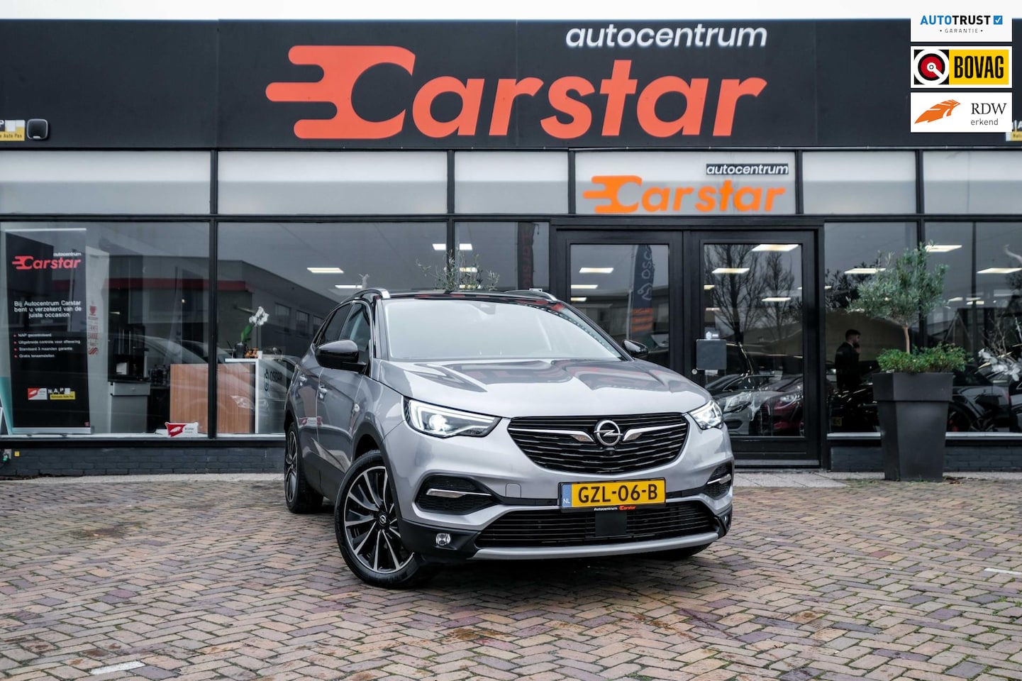 Opel Grandland X - 1.6 Turbo Hybrid4 Ultimate|CRUISE|CARPLAY|CAMERA - AutoWereld.nl