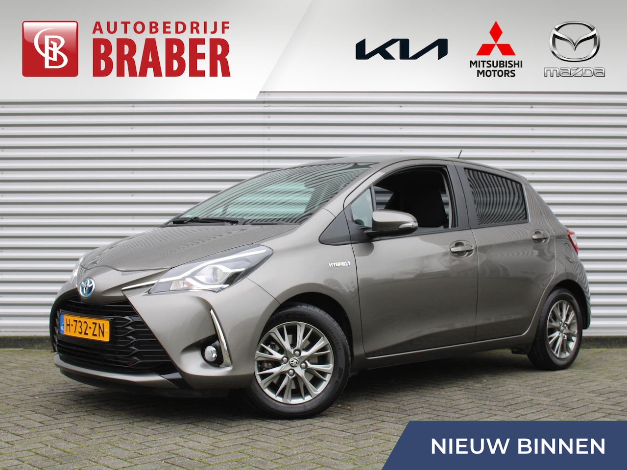 Toyota Yaris - 1.5 Hybrid Dynamic | Airco | Camera | 15" LM | Trekhaak fietsendrager | Weinig km | Apple - AutoWereld.nl