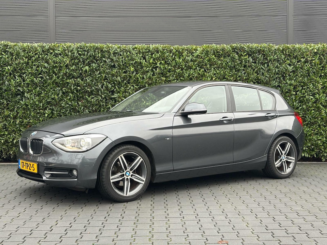 BMW 1-serie - 116i BUSINESS+ SPORT AUTOMAAT, AIRCO, NAVI, CRUISE, 17INCH, SPORTSTOELEN, PDC, NIEUW MODEL - AutoWereld.nl