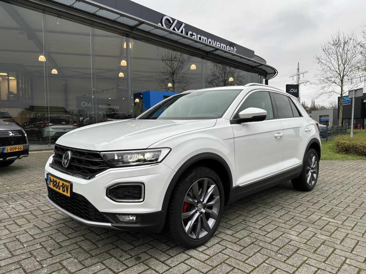 Volkswagen T-Roc - 1.5 TSI 150PK Sport Automaat | Navi | Camera | Trekhaak | ACC | - AutoWereld.nl