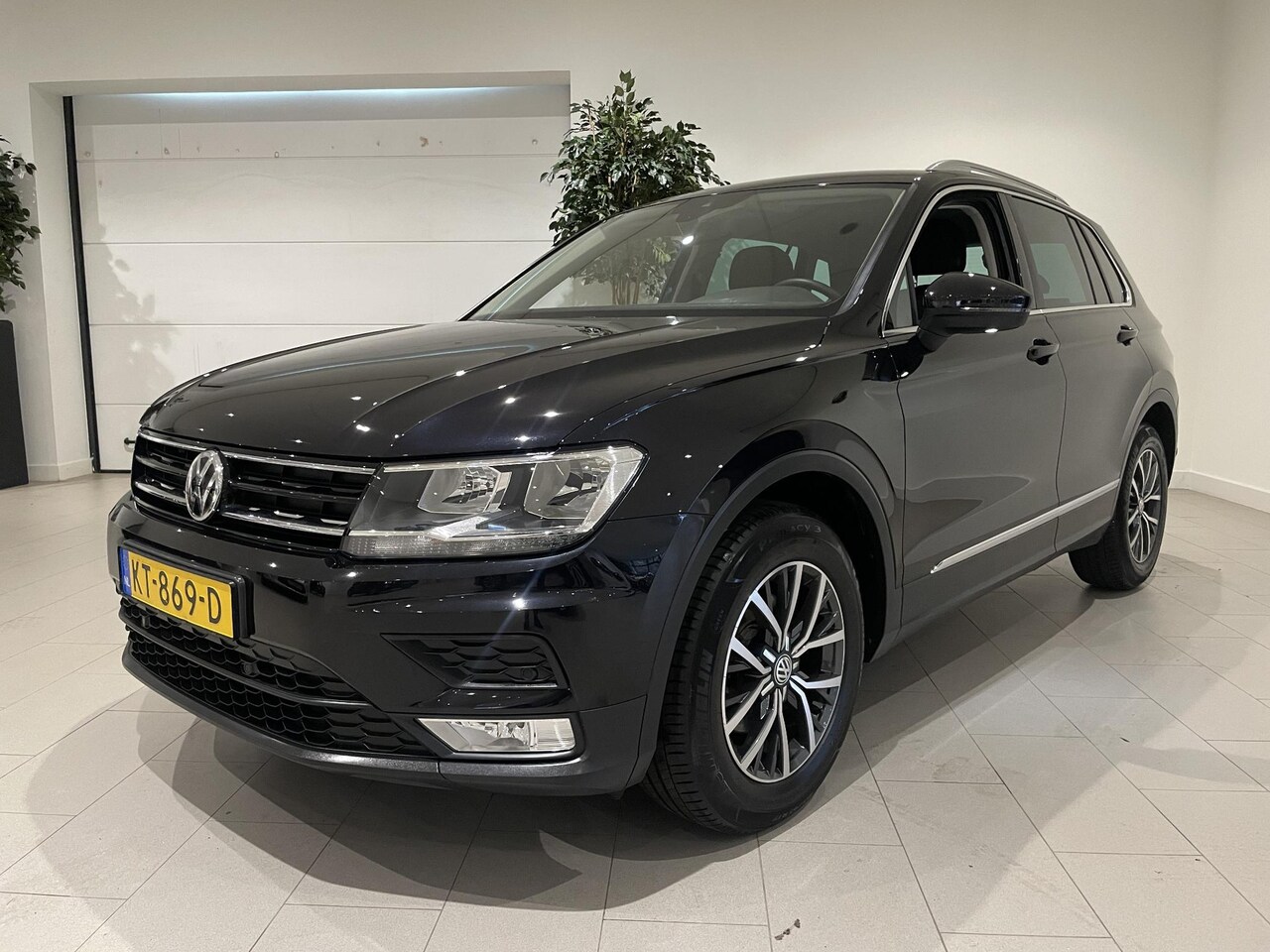 Volkswagen Tiguan - 1.4 TSI Comfortline 125 PK | Navigatie | Parkeersensoren | Cruise Control | Climate Contro - AutoWereld.nl