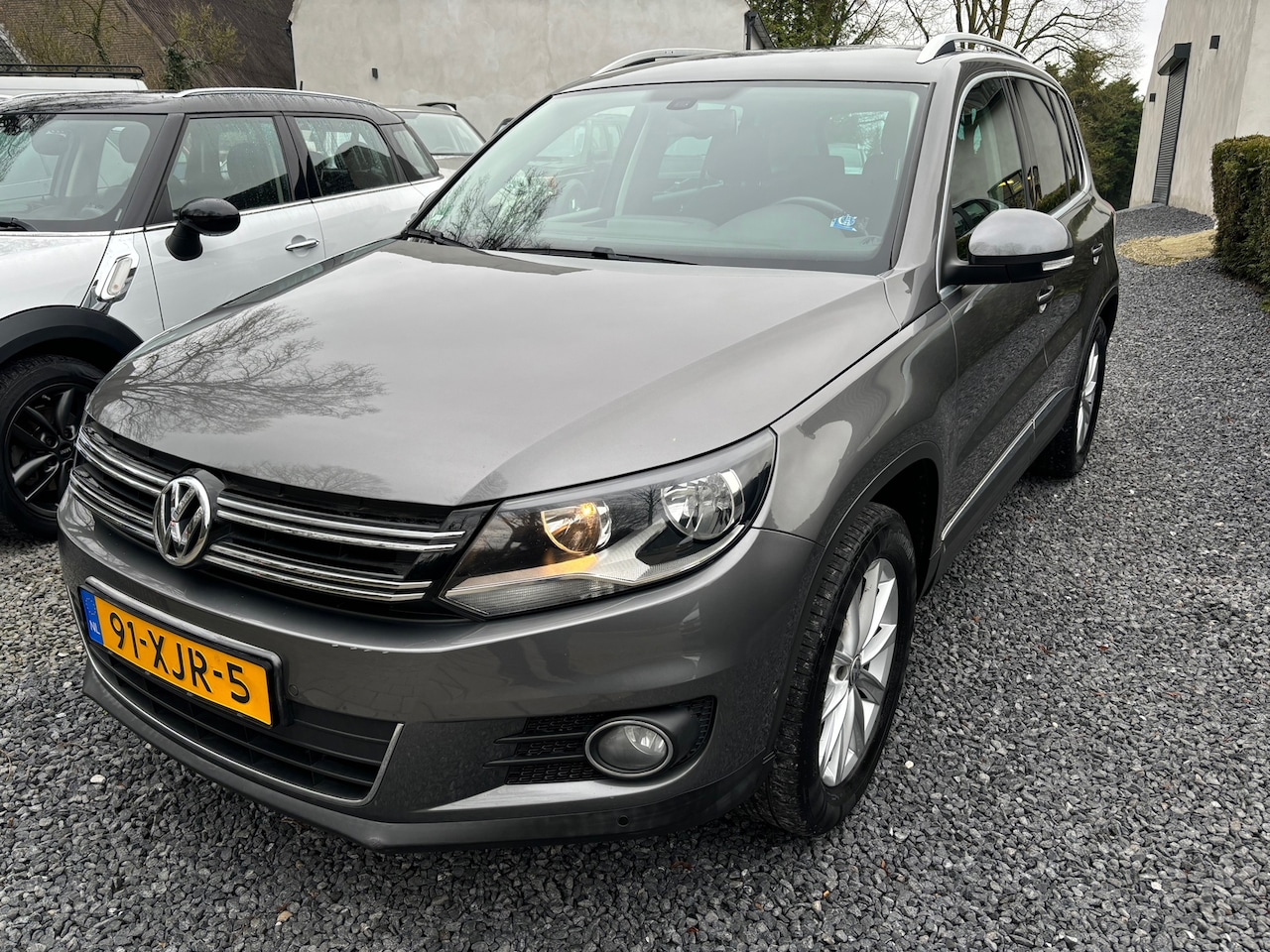 Volkswagen Tiguan - 1.4 TSI Sport&Style KM 137587 MET NAP - AutoWereld.nl