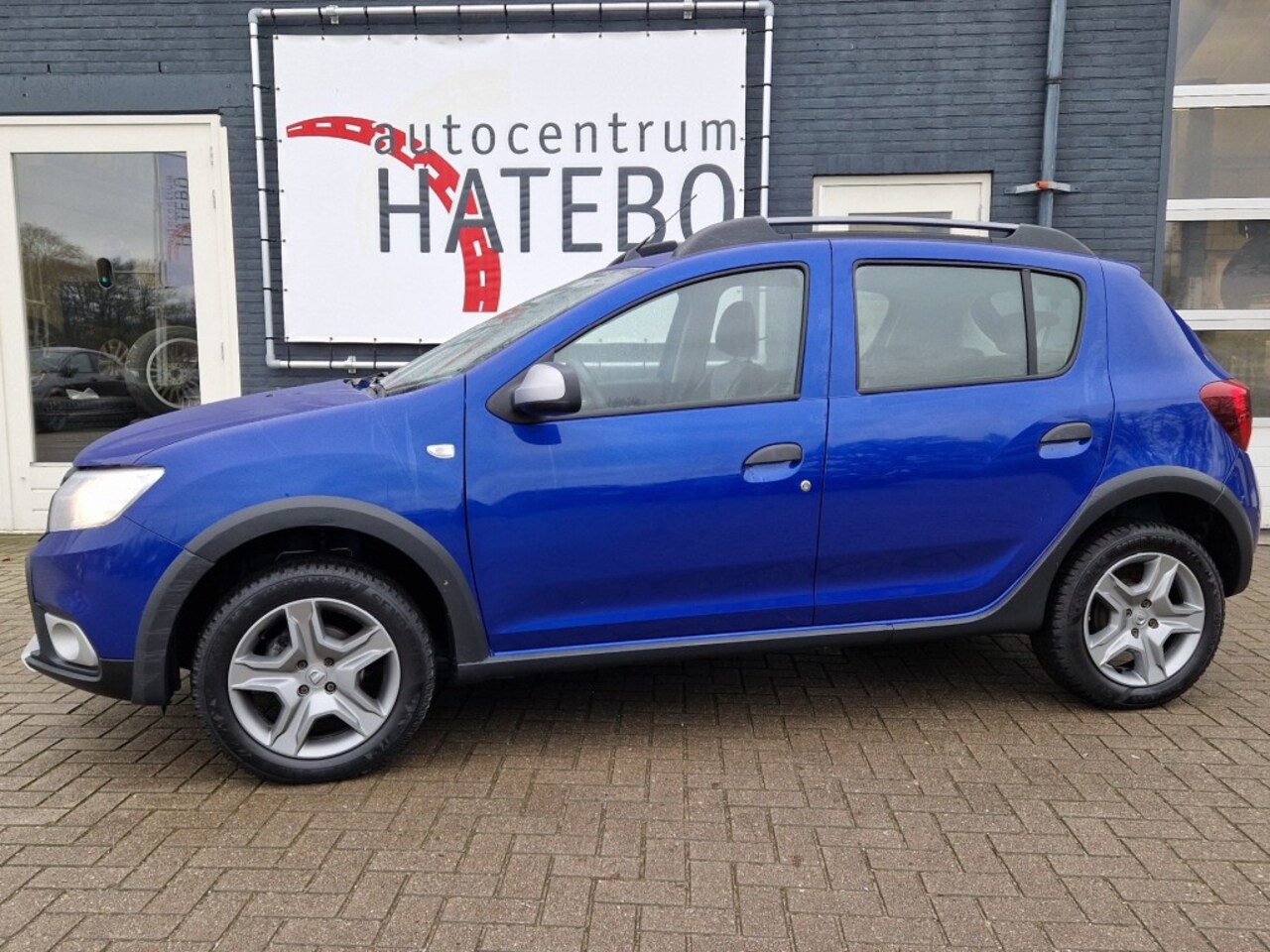 Dacia Sandero Stepway - 0.9 TCE Stepway Airco Cruise Navi Cross Camera LM 17Mooi - AutoWereld.nl