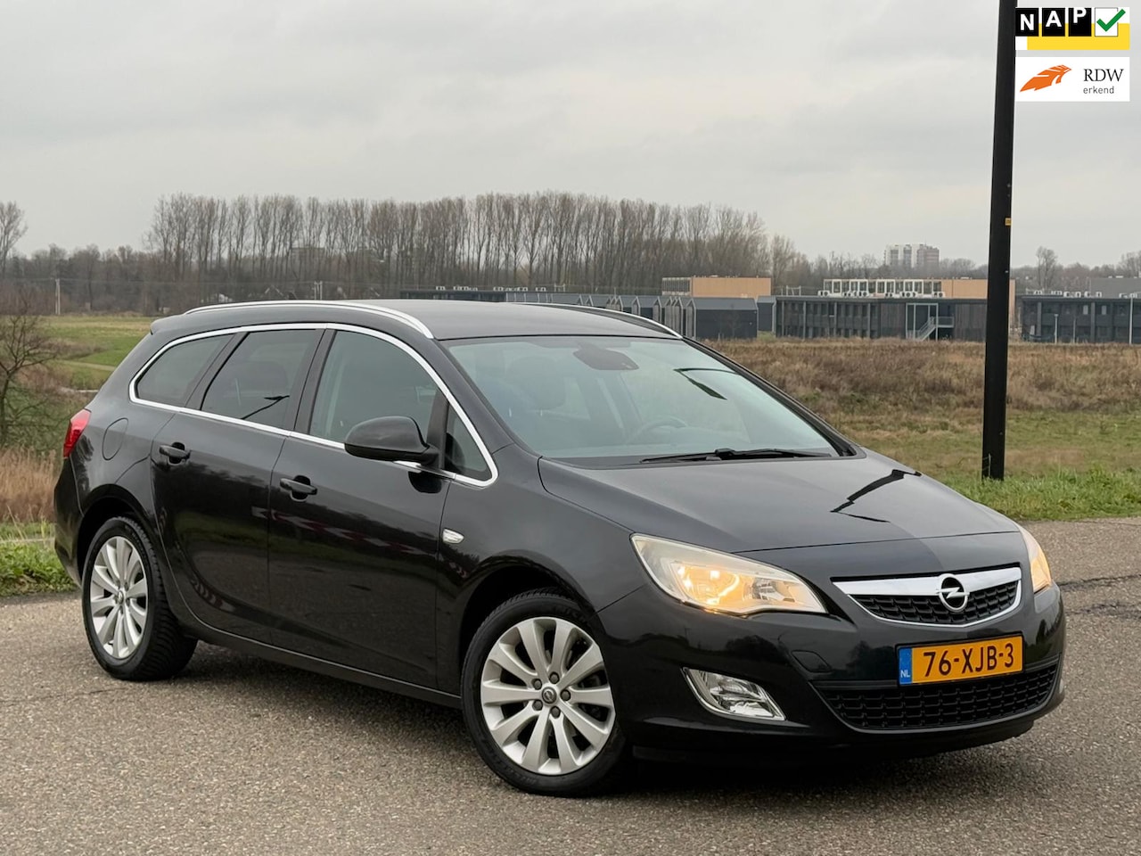 Opel Astra Sports Tourer - 1.4 Turbo Cosmo Leder| Navi| Cruise| Nap| Boekjes - AutoWereld.nl