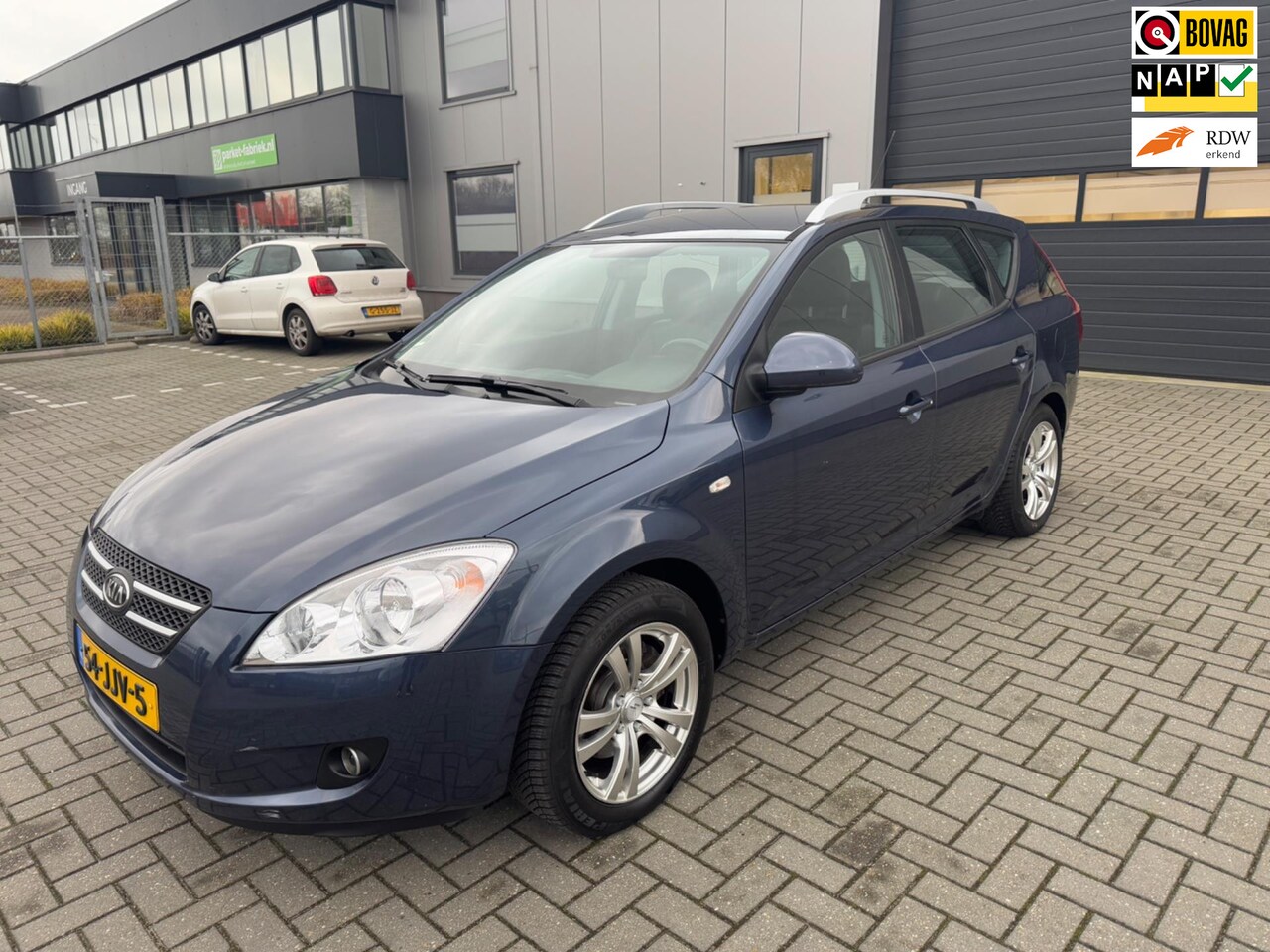 Kia Cee'd Sporty Wagon - 1.4 X-ecutive ISG 1.4 X-ecutive ISG - AutoWereld.nl