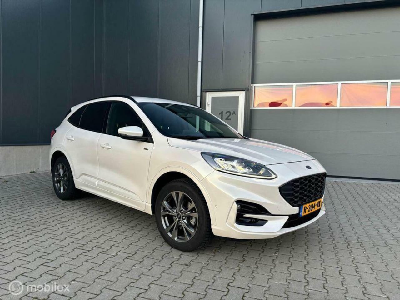 Ford Kuga - 2.5 PHEV ST-Line X 2.5 PHEV ST-Line X, 2021 224PK als nieuw, hybride - AutoWereld.nl