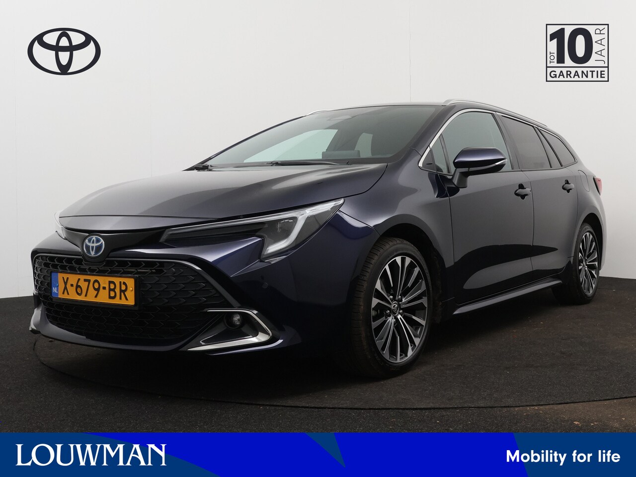 Toyota Corolla Touring Sports - 1.8 140 Hybrid First Edition | Parkeersensoren | LM velgen | Stoelverwarming | Cruise Cont - AutoWereld.nl