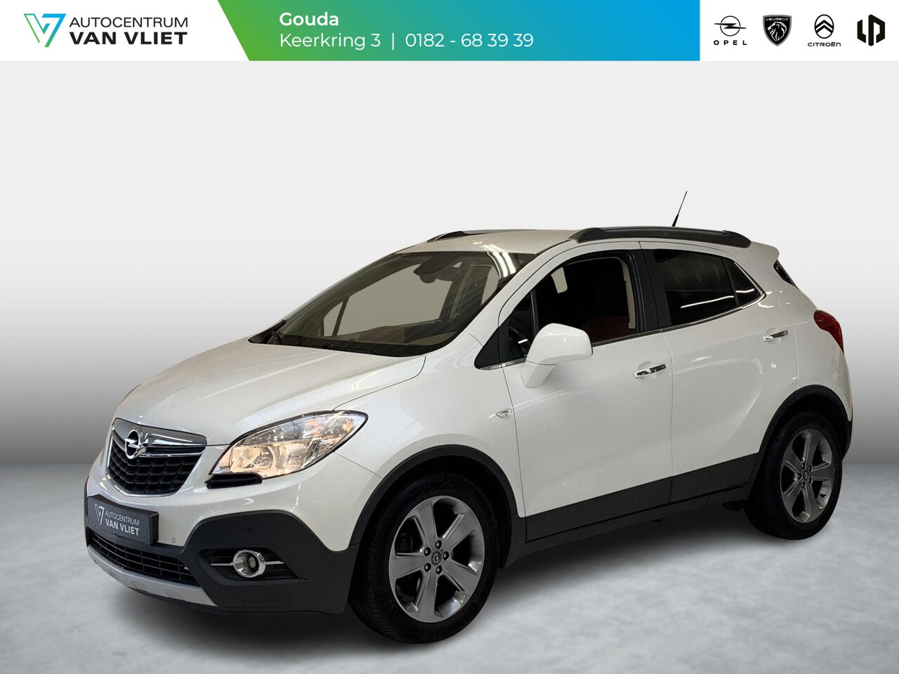 Opel Mokka - 1.4 T Cosmo Navigatie | Achteruitrijcamera | Cruise control | Parkeersensoren voor en acht - AutoWereld.nl