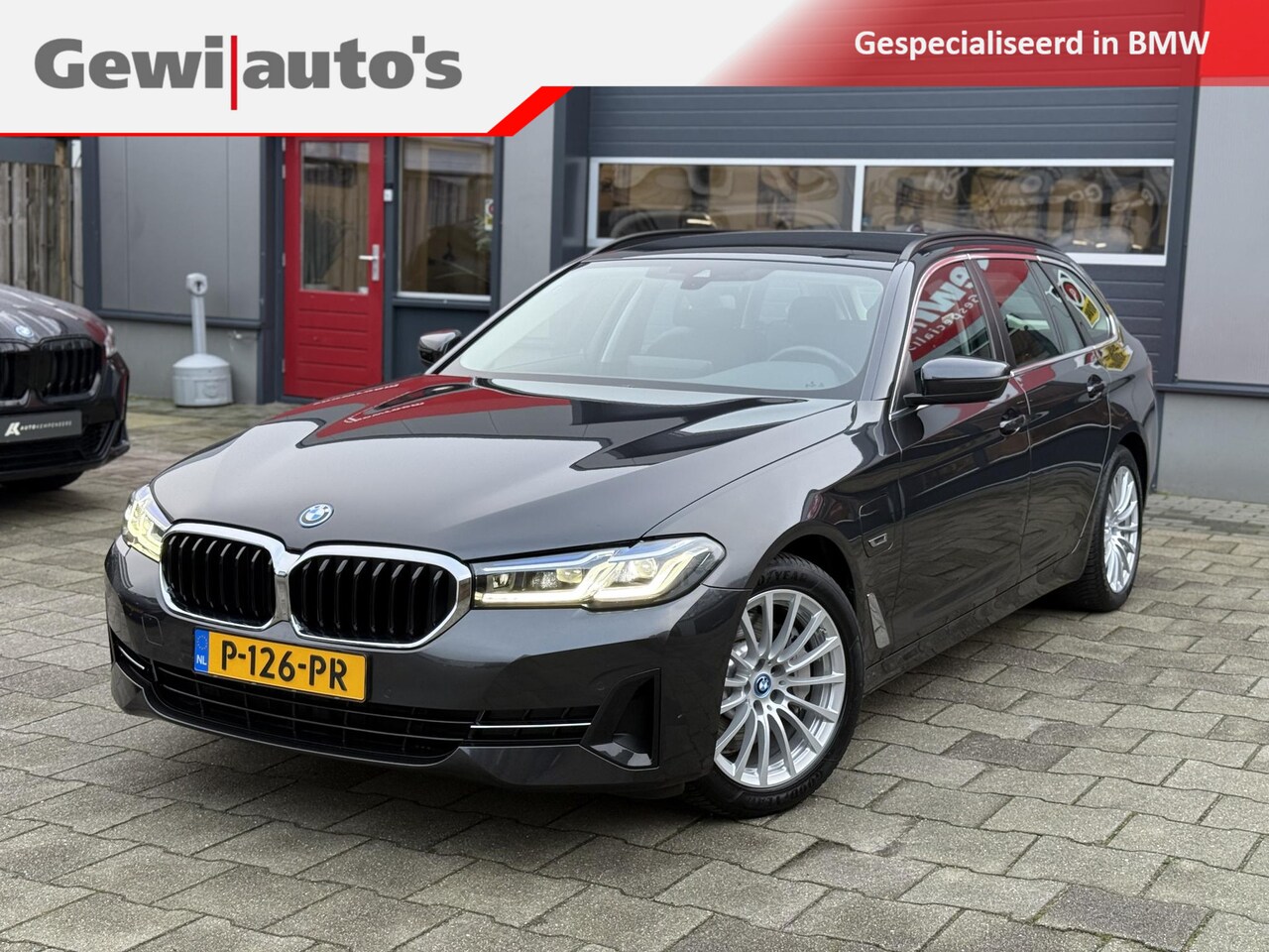 BMW 5-serie Touring - 520e High Executive org NL Laserlicht - AutoWereld.nl