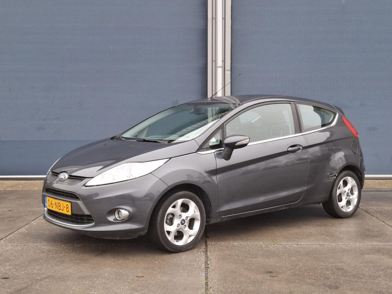 Ford Fiesta - 1.25 Titanium BENZINE / N.A.P / AIRCO/ APK T/M  9-2025 - AutoWereld.nl