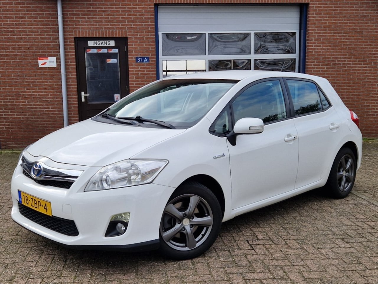 Toyota Auris - 1.8 Full Hybrid Executive Business NL-auto Clima Navi Camera - AutoWereld.nl