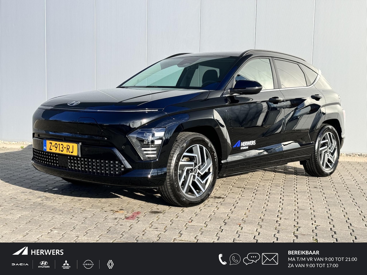 Hyundai Kona - Comfort Smart Limited 65.4 kWh /  Navigatie / Head Up Display / Climate Control / Cruise C - AutoWereld.nl