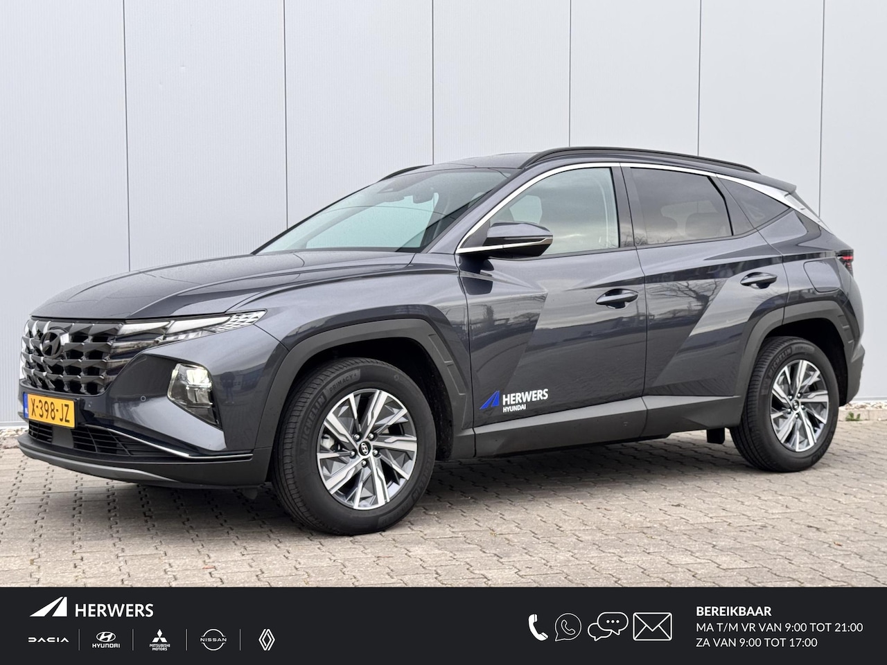 Hyundai Tucson - 1.6 T-GDI HEV Comfort Smart / Trekhaak / Navigatie + Apple Carplay/Android Auto / Climate - AutoWereld.nl