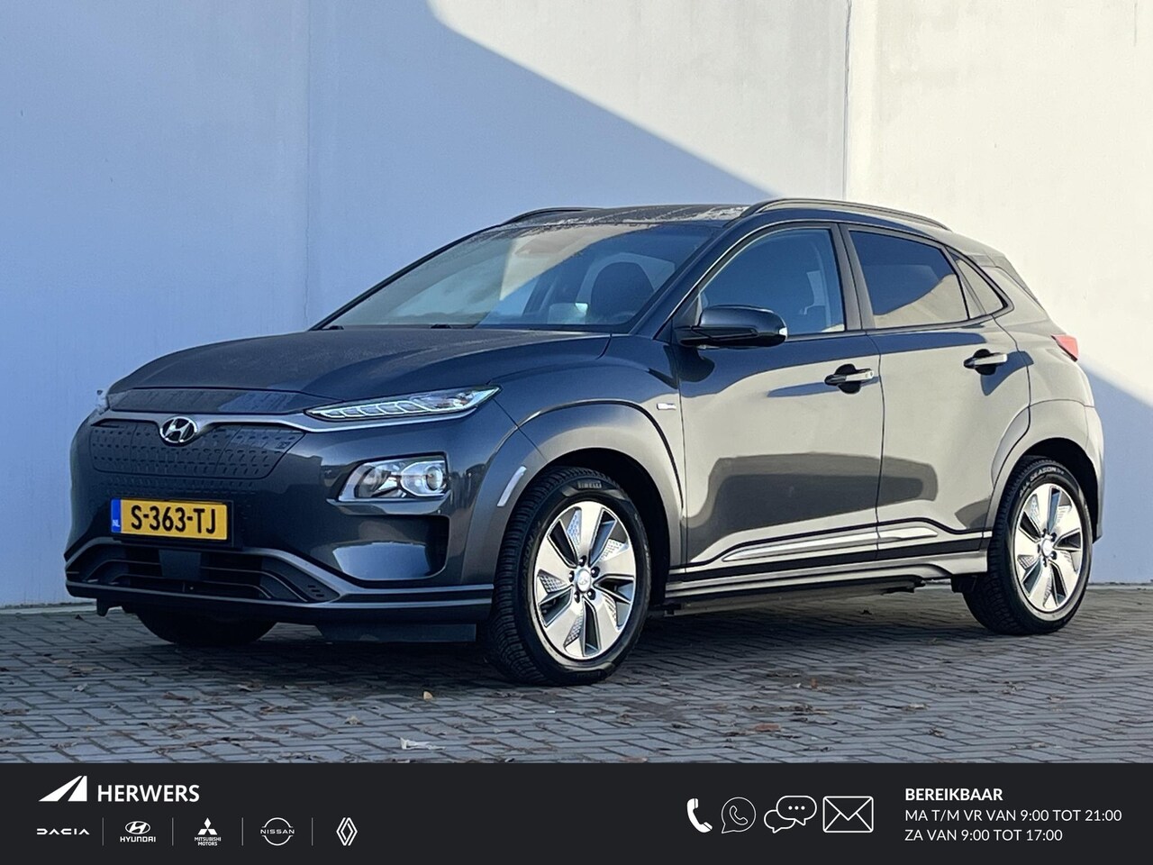 Hyundai Kona Electric - EV Comfort 64 kWh / APPLE CARPLAY/ANDROID AUTO / BLUELINK / STOELVERWARMING / ACHTERUITRIJ - AutoWereld.nl