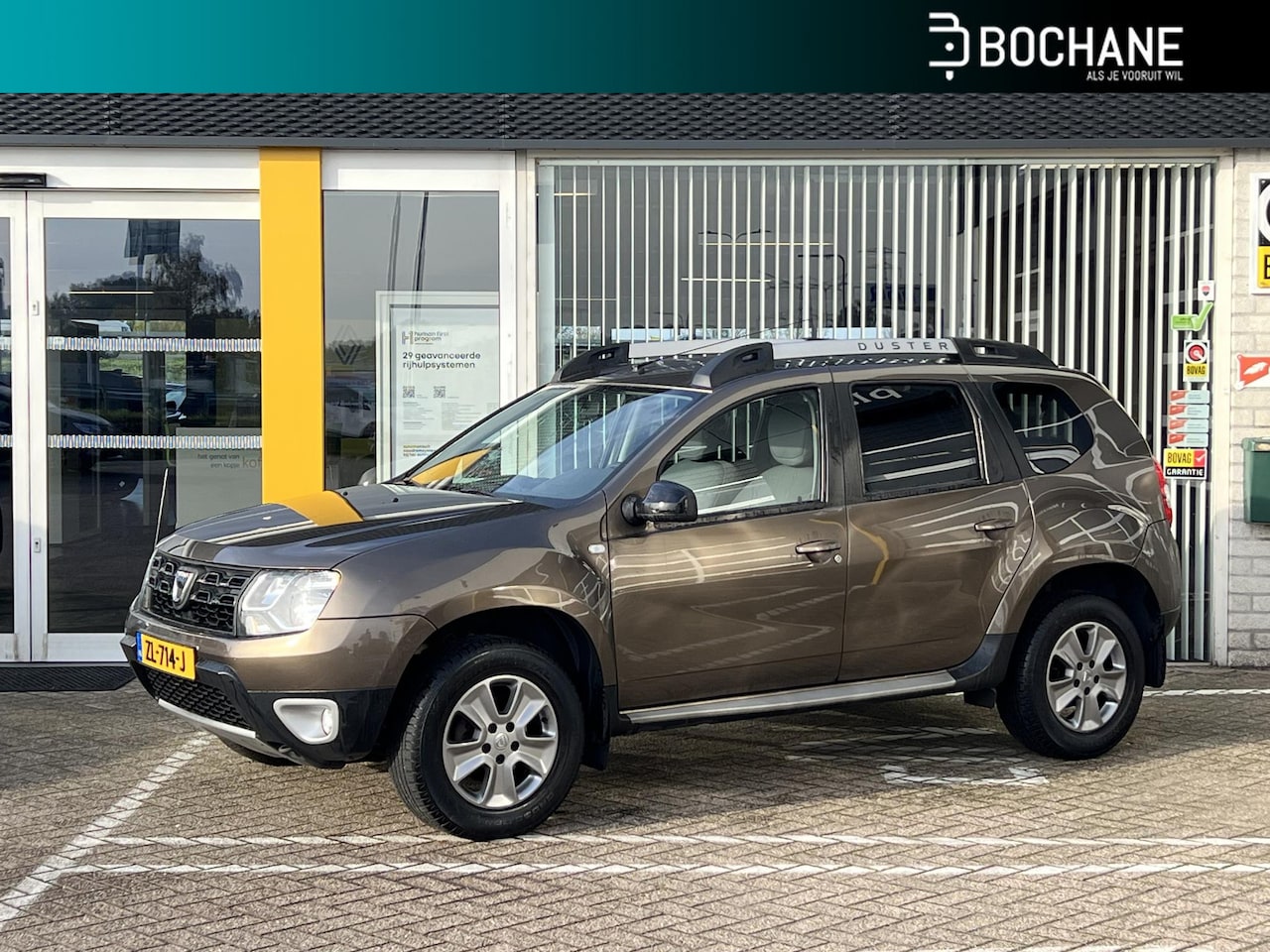 Dacia Duster - 1.2 TCe 125 Lauréate | Trekhaak | Navigatie | Achteruitrijcamera | - AutoWereld.nl