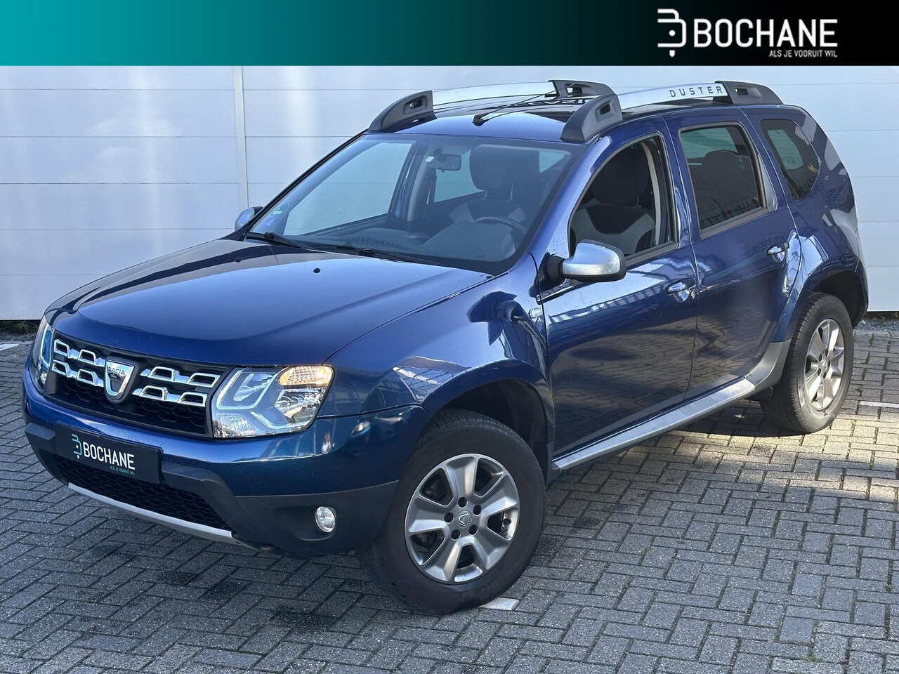 Dacia Duster - 1.2 TCe 125 Lauréate | Trekhaak | Navi | Cruise | Airco | LMV. | Historie | NL Auto! - AutoWereld.nl