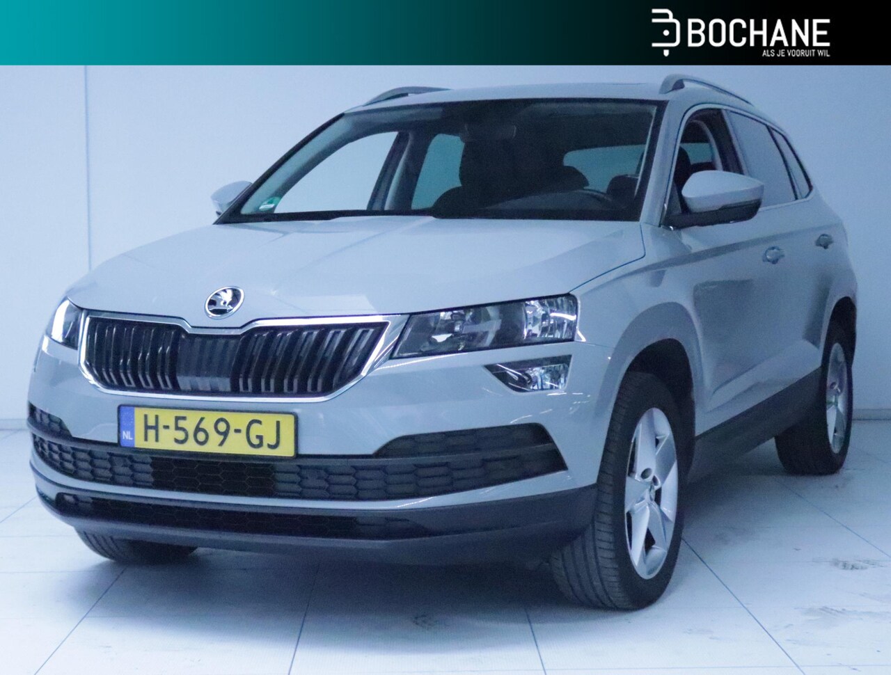 Skoda Karoq - 1.0 TSI Ambition Business Schuifdak/Clima/Navi - AutoWereld.nl