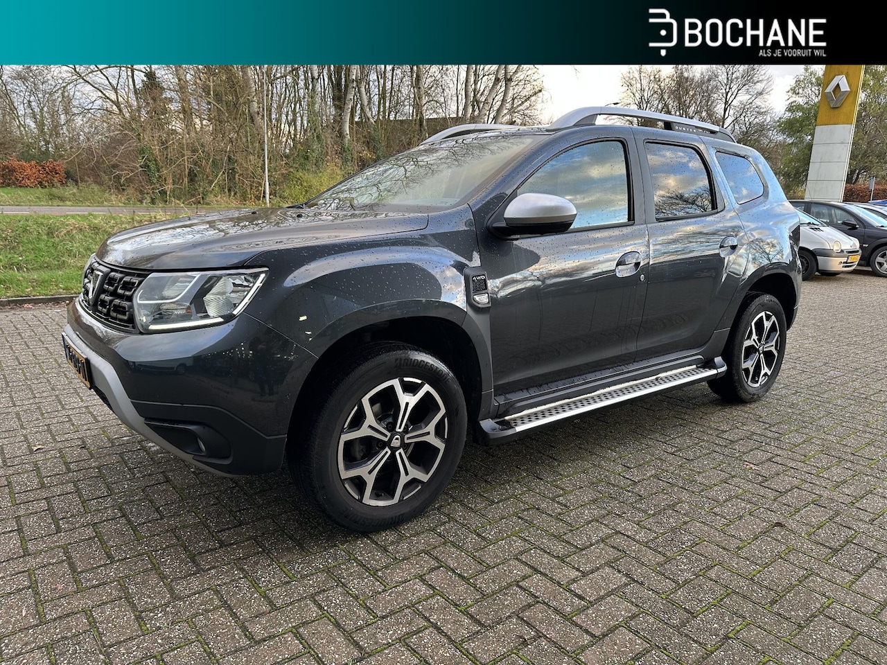 Dacia Duster - 1.2 TCe 125 4x4 Prestige | Trekhaak | Navi | Clima | Leder | Cruise | Keyless | 360° camer - AutoWereld.nl