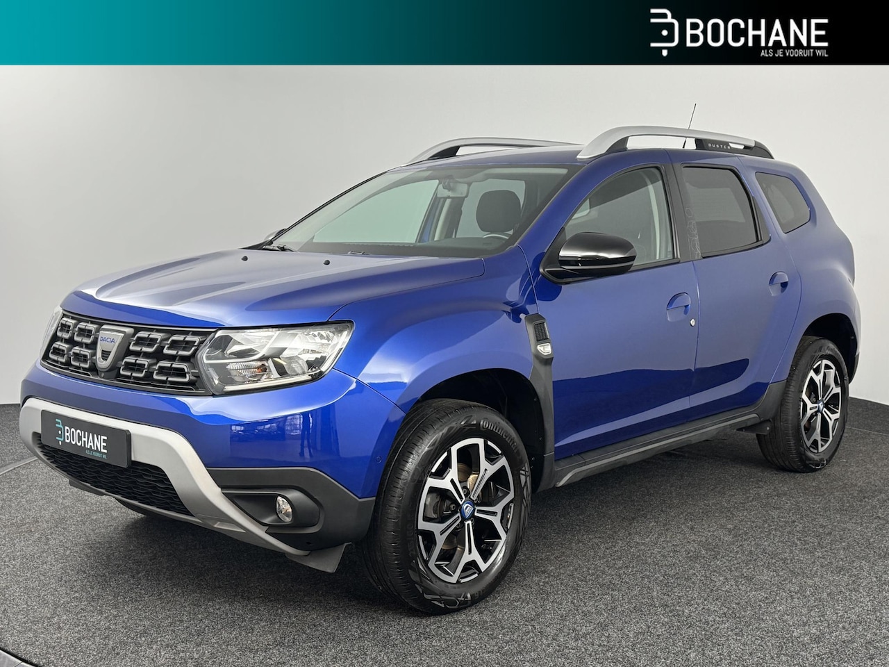 Dacia Duster - 1.0 TCe 100 Bi-Fuel SL 15th Anniversary | Navi | Clima | Cruise | 360° camera | Stoelverwa - AutoWereld.nl