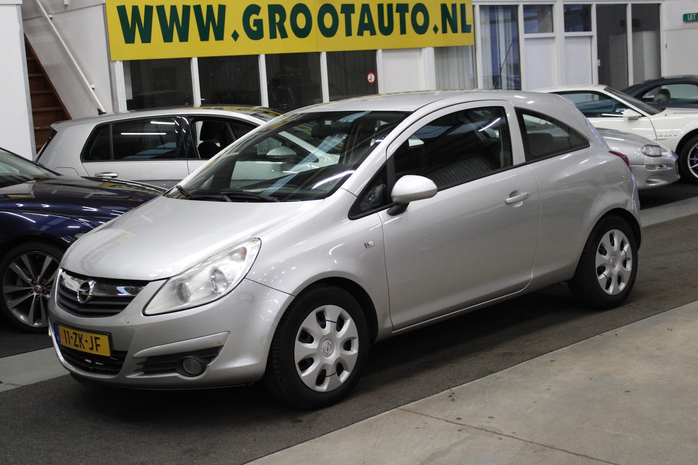 Opel Corsa - 1.2-16V Enjoy Airco, Cruise control, Isofix, Stuurbekrachtiging - AutoWereld.nl