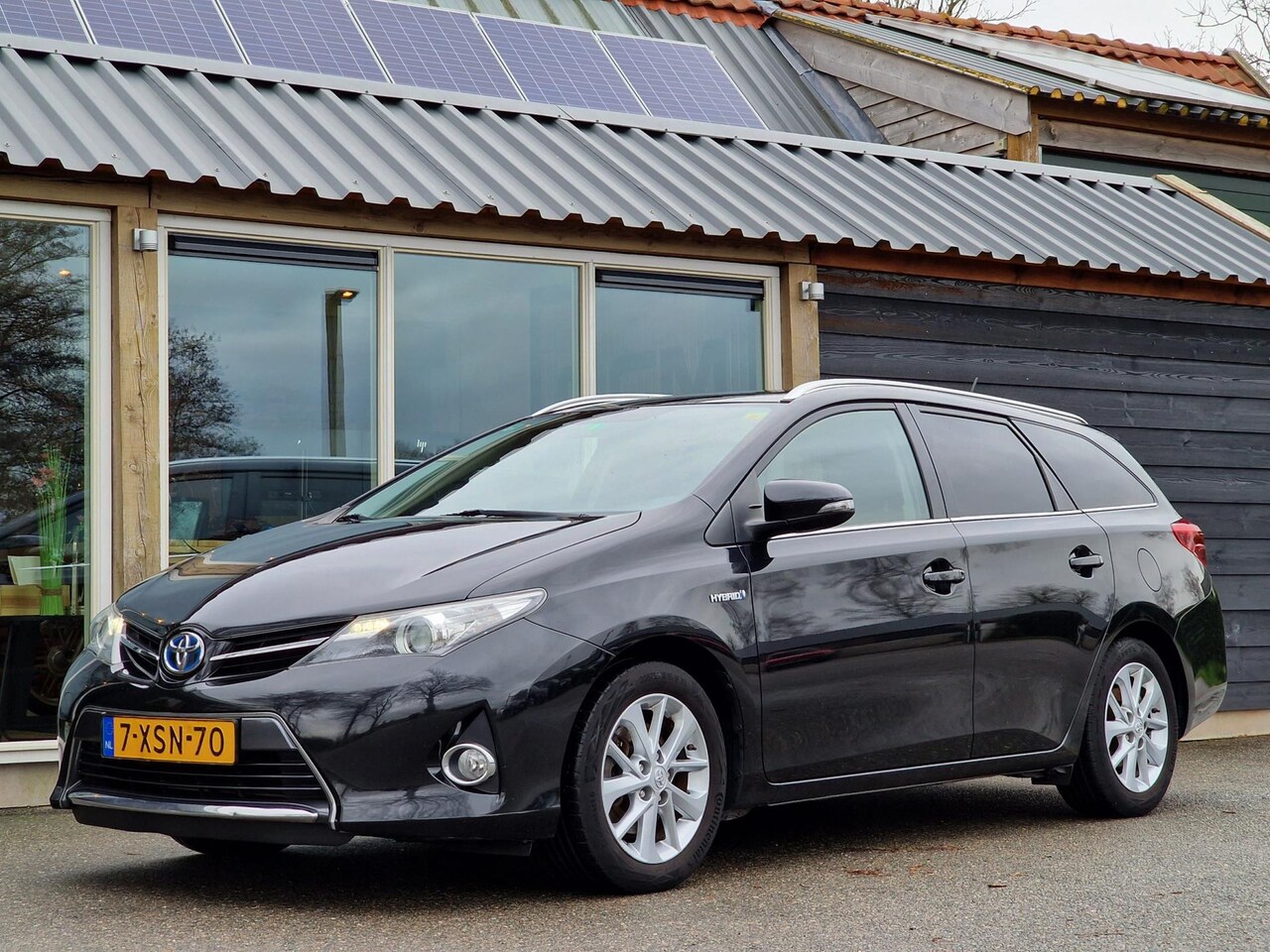 Toyota Auris Touring Sports - 1.8 Hybrid Lease 1.8 Hybrid Lease (Trekhaak / Panoramadak / Cruise / Climate / Zeer zuinig) - AutoWereld.nl