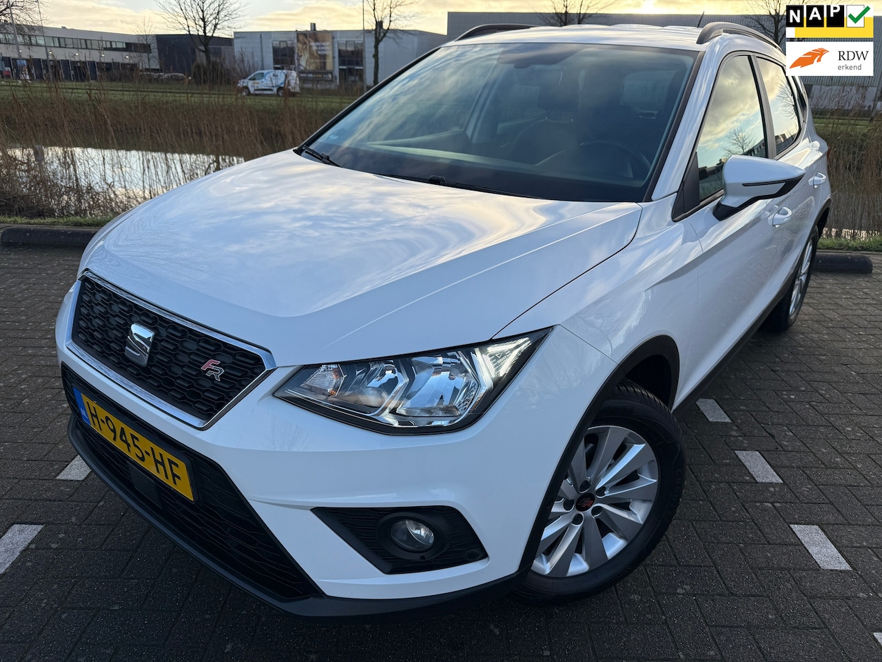 Seat Arona - 1.0 TSI Business*CRUISE*PARK SENSOREN*NAVI*CARPLY*NAP*NEW APK*TERKHAAK*VELGEN*ELKT-RAAM - AutoWereld.nl