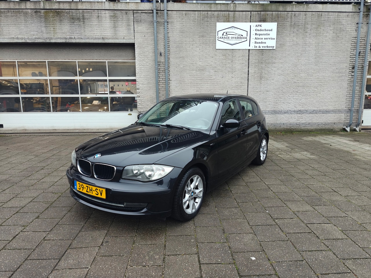 BMW 1-serie - 116i 2008 5-DEURS/NL-AUTO/NAVI/CARPLAY/LMV/AIRCO/APK!!!! - AutoWereld.nl