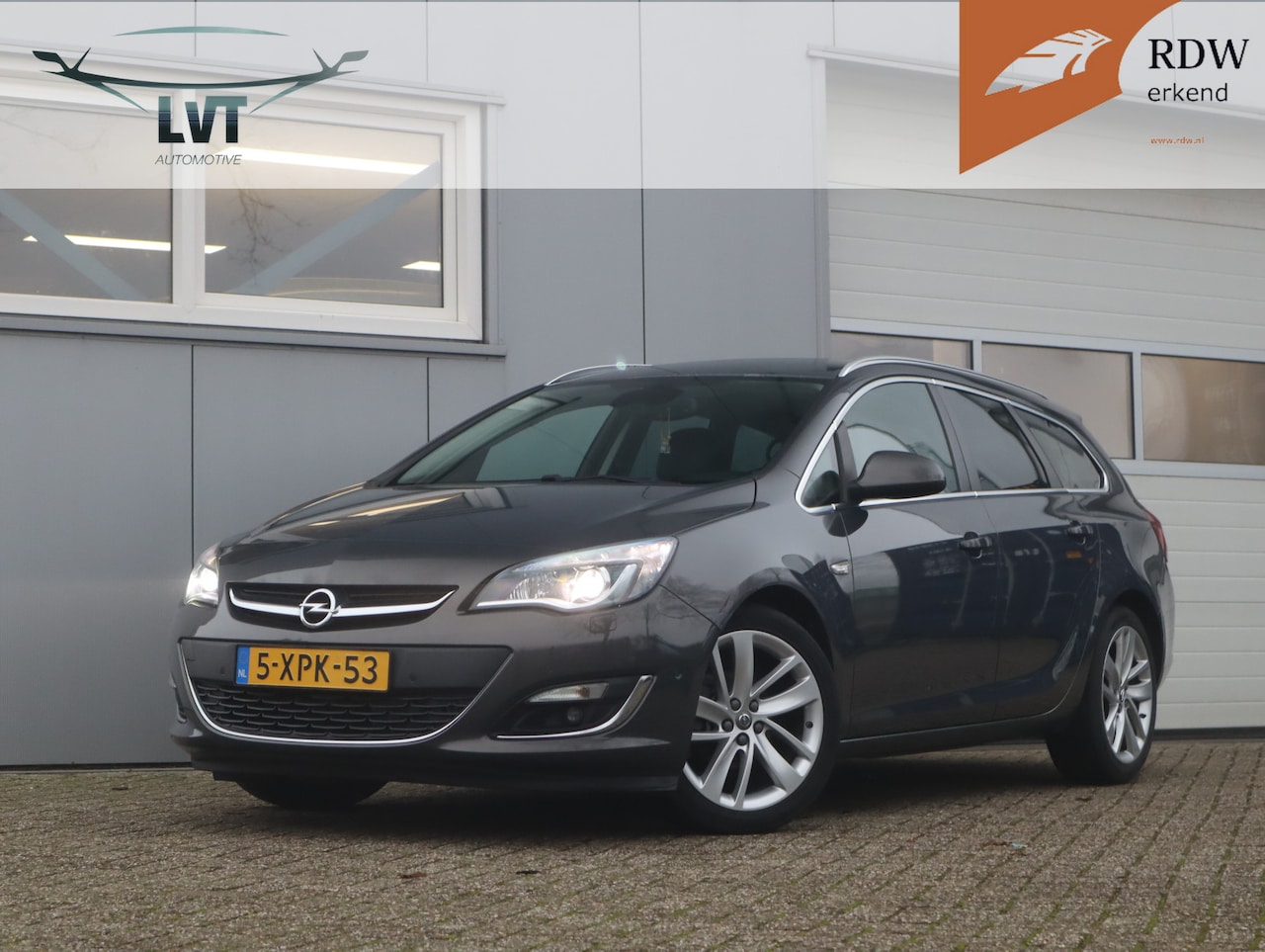 Opel Astra Sports Tourer - 1.4 Turbo Sport + / Sportstoelen / Leder / Camera - AutoWereld.nl