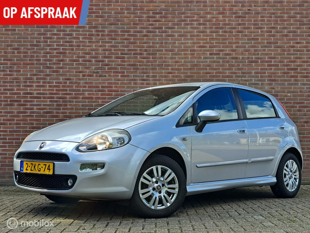 Fiat Punto Evo - 0.9 TwinAir Street/AIRCO/CRUISE/ALLSEASON - AutoWereld.nl