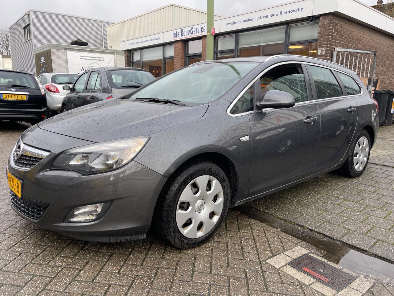 Opel Astra Sports Tourer - 1.4 Turbo Sport 1.4 Turbo Sport - AutoWereld.nl