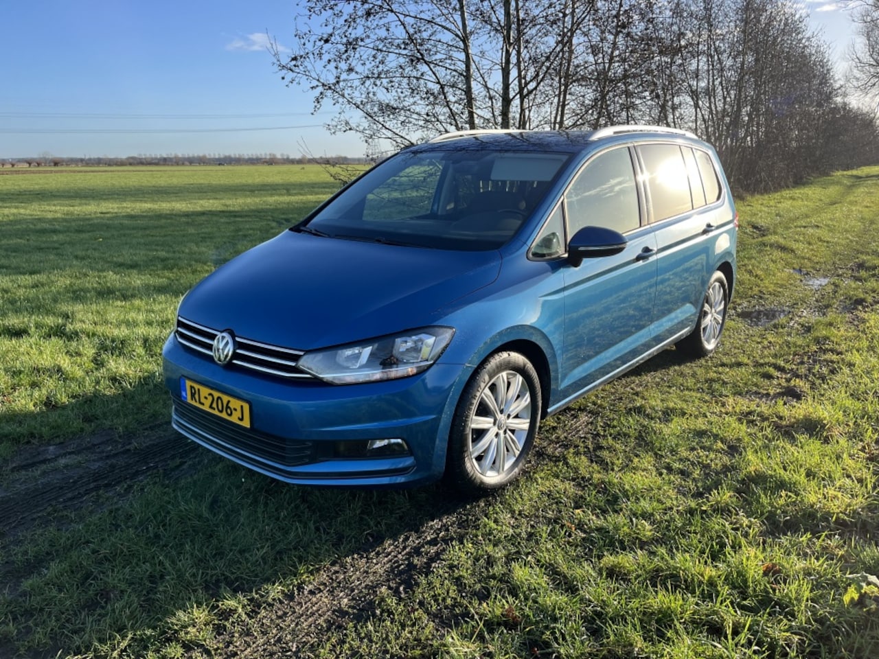 Volkswagen Touran - 1.2 TSI Comf Bns 7p - AutoWereld.nl