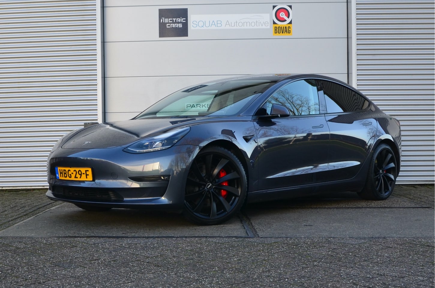 Tesla Model 3 - Performance AWD 75 kWh FSD, Ohlins instelbare schokbrekers en veren! - AutoWereld.nl