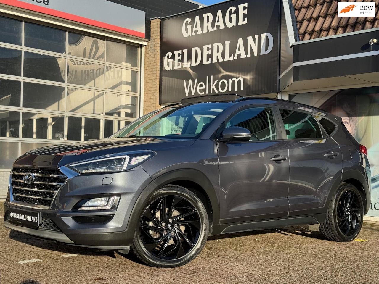 Hyundai Tucson - 1.6 177PK Premium | Pano | Volleder | Navi | Camera | Xenon | Apple/Android | Cruise | Cli - AutoWereld.nl