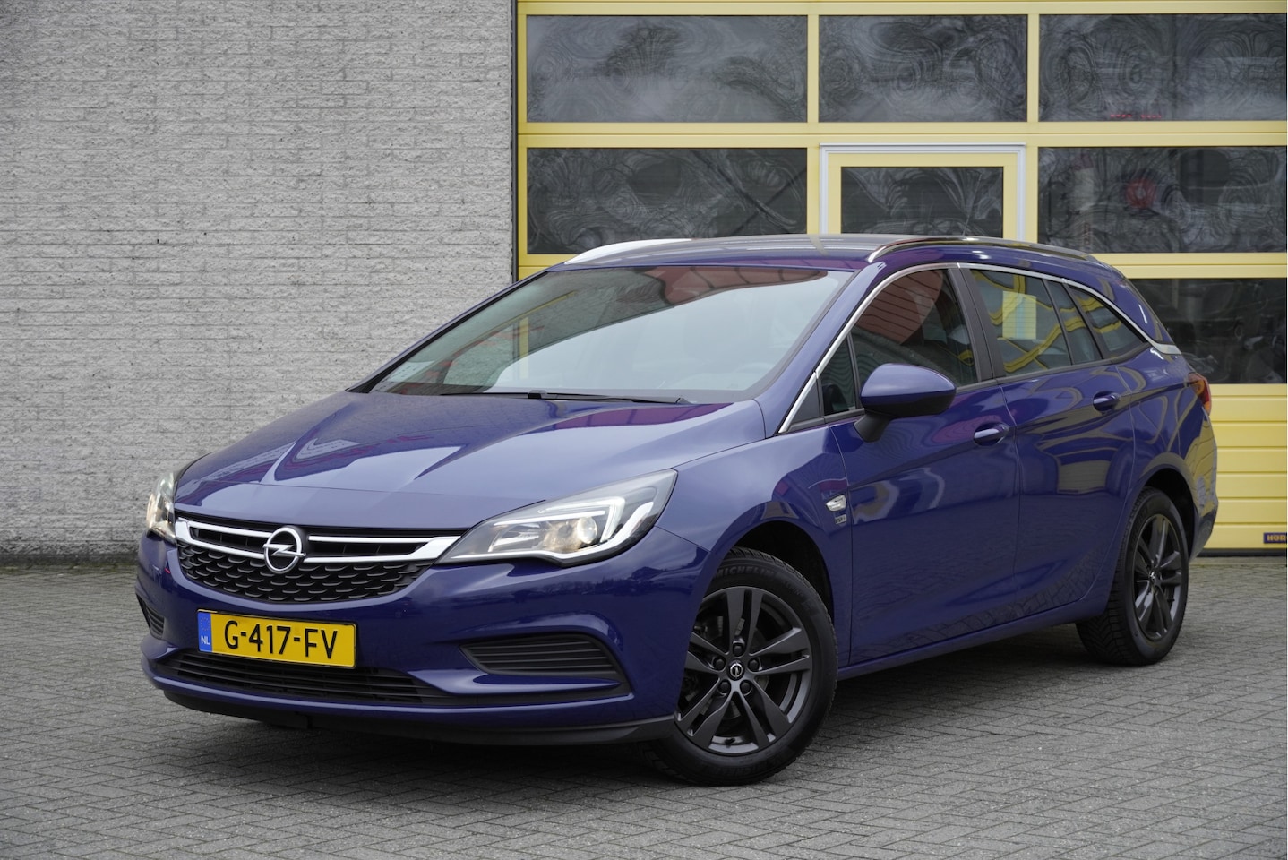 Opel Astra Sports Tourer - 1.0 Turbo 120 Jaar Edition BJ2019 Lmv 16" | Led | Navi | Trekhaak | Airco | Cruise control - AutoWereld.nl