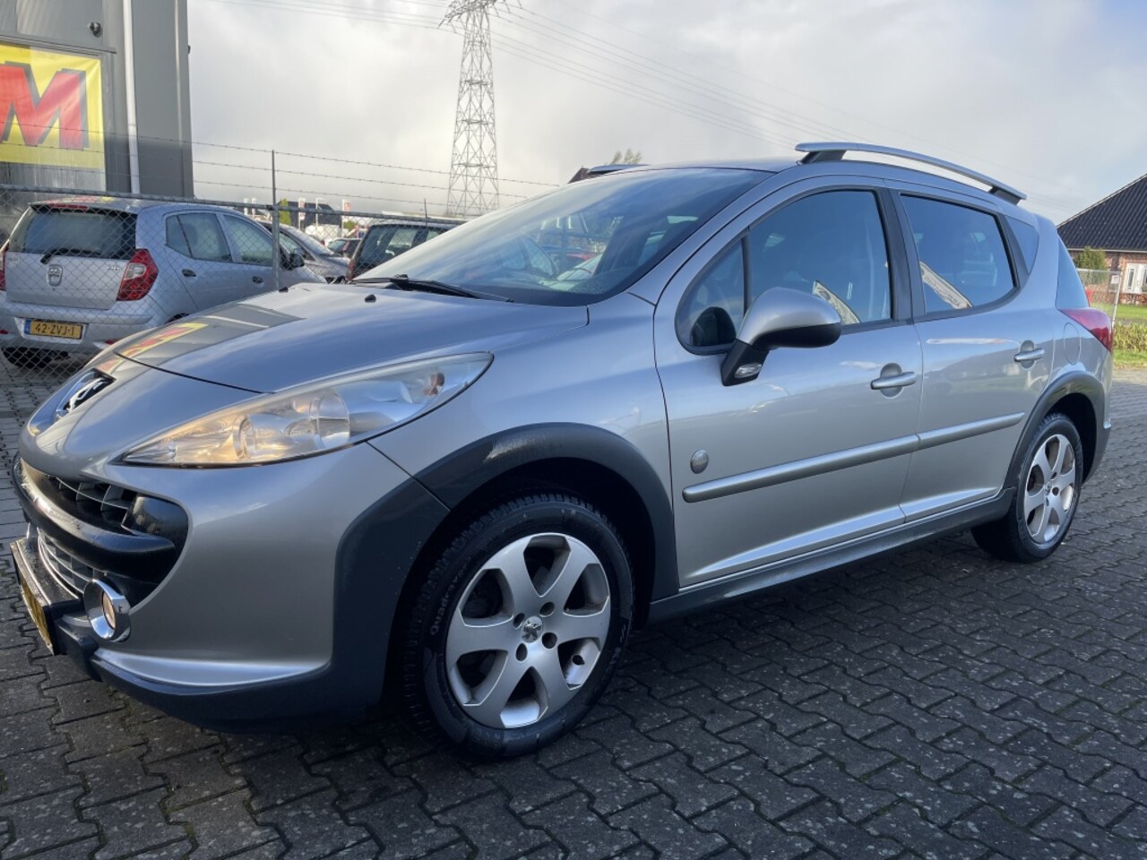 Peugeot 207 SW Outdoor - 1.6 VTi XS airco panoramadak - AutoWereld.nl